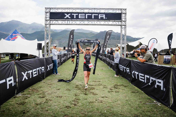 XTERRA South Africa start line with competitors gathered under branded arch at Grabouw – professional event photographer