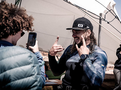 Josh Emanuel, kite surfer for CORE Kites, at the 2022 Red Bull King of the Air. KOTA is the biggest big air kite surf event in the world in Cape Town, Blouberg- Photo captured by a professional sports, model and lifestyle photographer from Cape Town