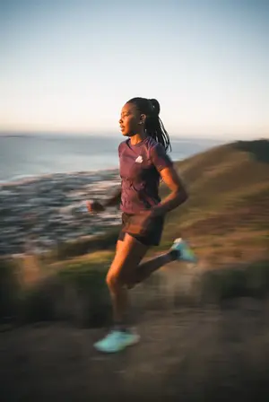 Sunset trail running session with the Atlantic Ocean visible, Cape Town