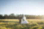 Bride and groom at sunset in Yellowstone National Park
