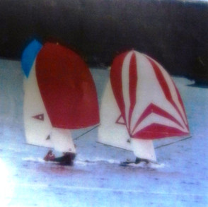 Article from historical skiff association of Alf’s 4th 10 Foot Skiff (Red Spinnaker) overtaking the opposition to leeward. Check the bow wave from both boats. Peter assured me his design enables the hull to sit higher and push through the water easier off the wind.
