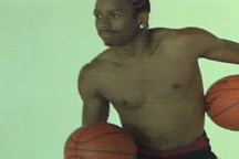 Allen Iverson dancing with two basketballs in his hands during a photo shoot