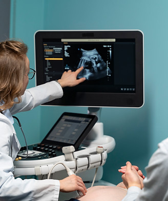 gynecologist-performing-ultrasound-consultation.jpg
