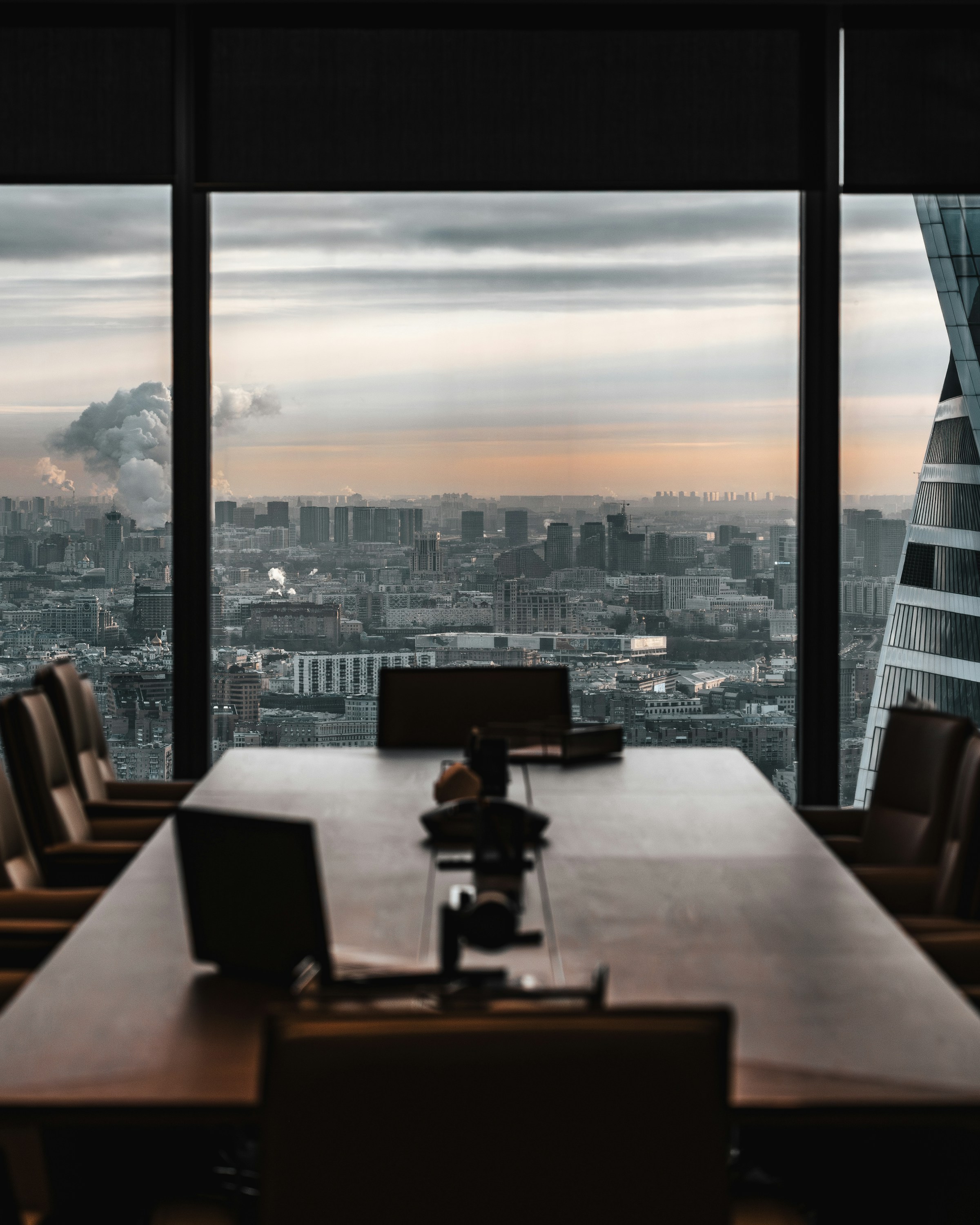 Business leadership team meeting around a conference table