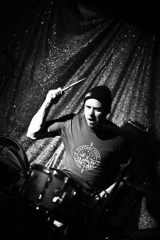 Tyler Cull on the drums with Local Bylaws