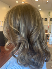 Shoulder-length bronde balayage with soft waves, back view