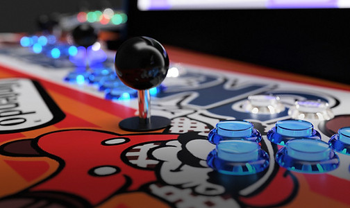Tabletop arcade control surface displaying blue LED buttons and custom Donkey Kong vinyl themed artwork.
