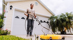 Pressure washing driveway and walkway at a home in The Villages, Florida