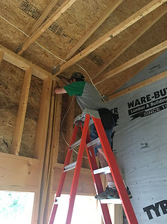 Kevin on ladder working
