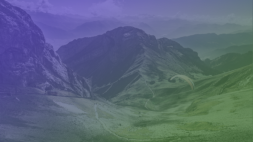 paragliding mountains banner.png