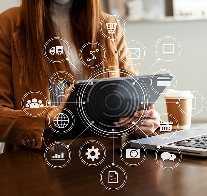 businesswoman-hand-working-with-laptop-computer-tablet-modern-office-with-virtual-icon-dia