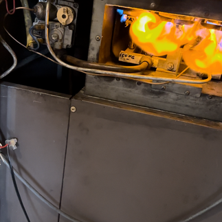 ATC Plumbing inspecting a dangerous ducted heater installation in Melbourne VIC with rolling flames
