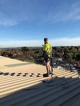 Plumber assessing a job in preparation for providing a quotation. 