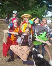 dress up fun at uk summer camp camping outdoors in beautiful setting south coast uk.webp