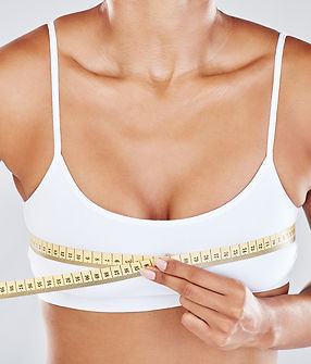 breast-measure-tape-and-woman-isolated-on-white-b-2023-11-27-04-55-23-utc.jpg