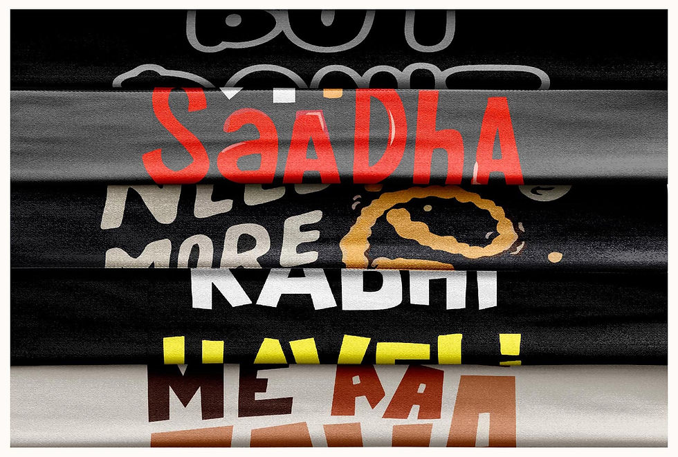 Thumbnail: Folded t-shirts with text: Saadha, Need More, Radhi, Have Me Ra, Tanzitex Studio.