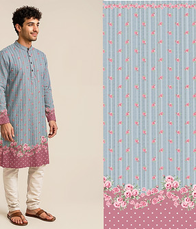 Man in gray kurta smiling next to floral pattern. Tanzitex Studio.