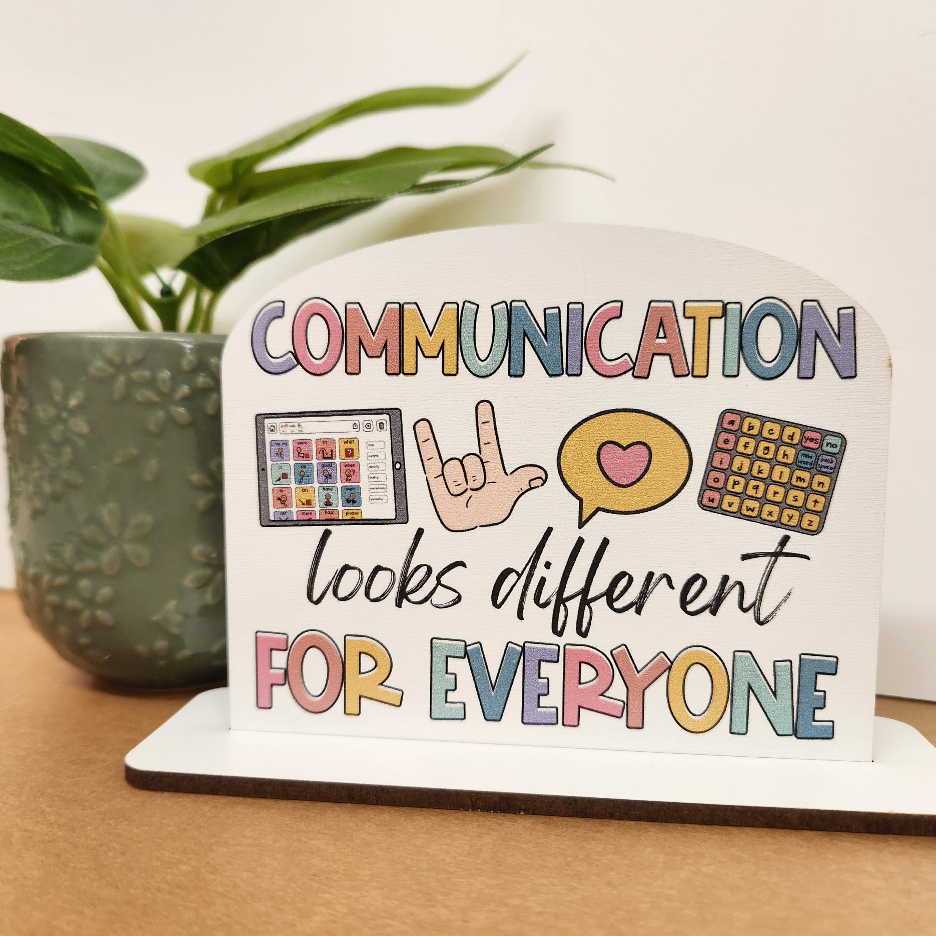 Communication looks different for everyone sign