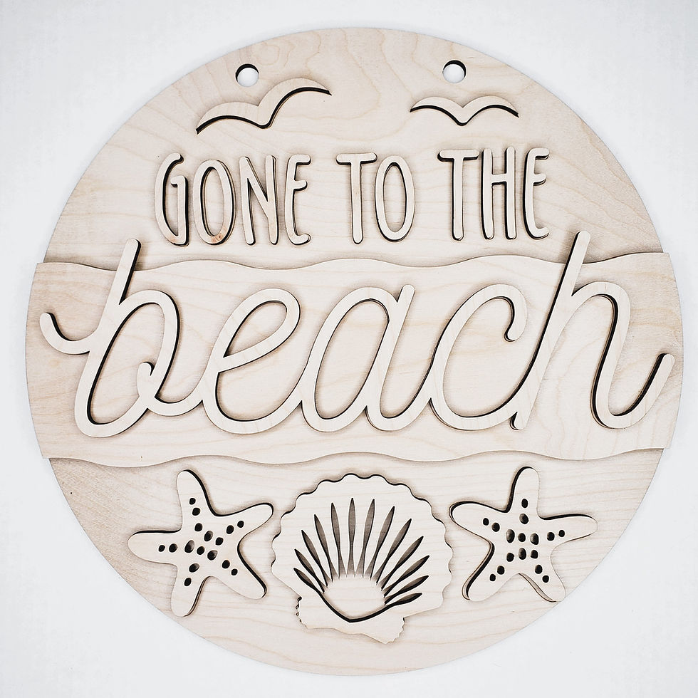 Round wooden beach sign: "Gone to the beach"