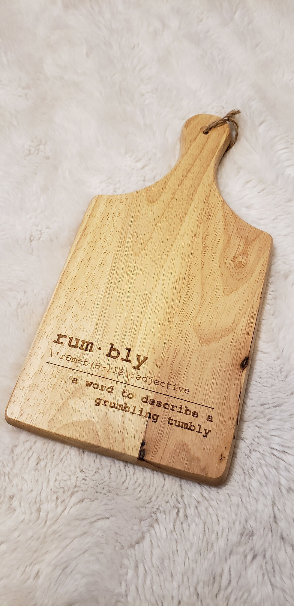 Thumbnail: Wooden cutting board with "rumbly" definition