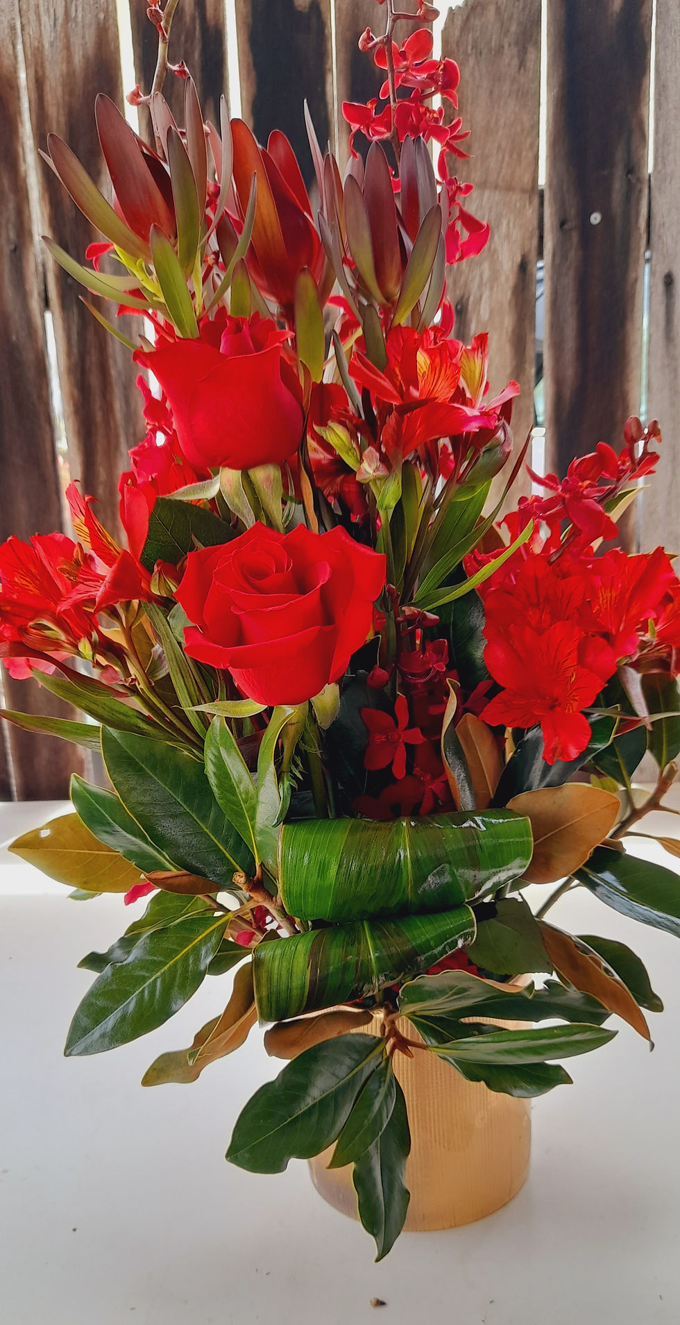 Christmas Arrangement In Golden Vase warringahflorist