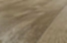 An Oak coffee table where the timber has been structured, highlighting the beauty of natural wood texture.