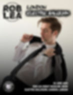 Rob Lea performing live with crowd and lights at a London venue