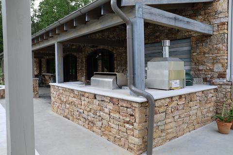 outdoor kitchen and wall.JPG