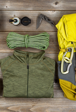Climbing gear for hiking on rustic wooden boards