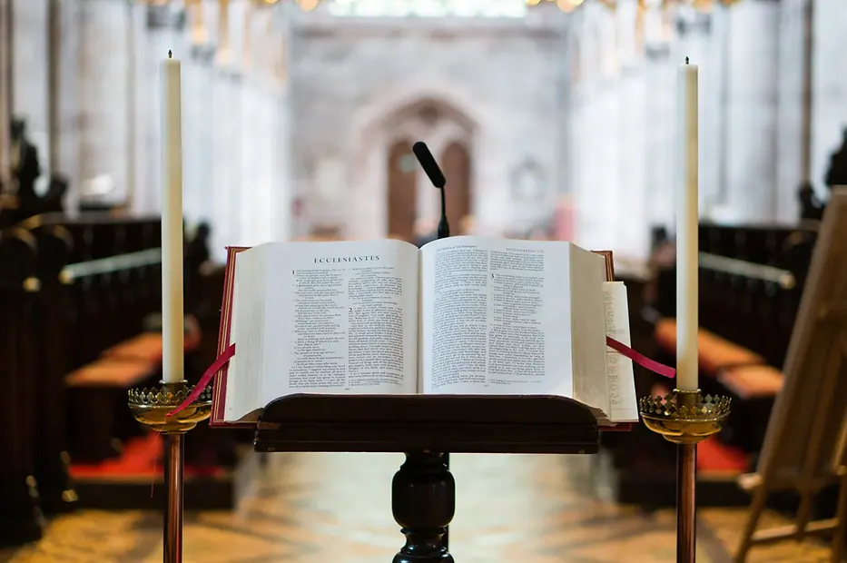 Bible on Pulpit - Controlling Church Members.webp