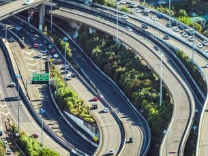 Heavy traffic on Auckland highways, showing the city's congestion crisis.