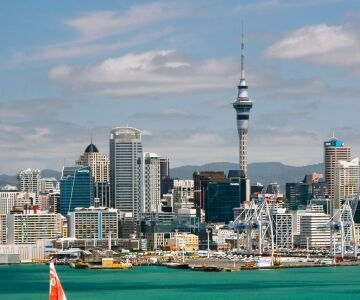 Sky Tower in Auckland, New Zealand, towering over the city skyline with stunning views and modern design.