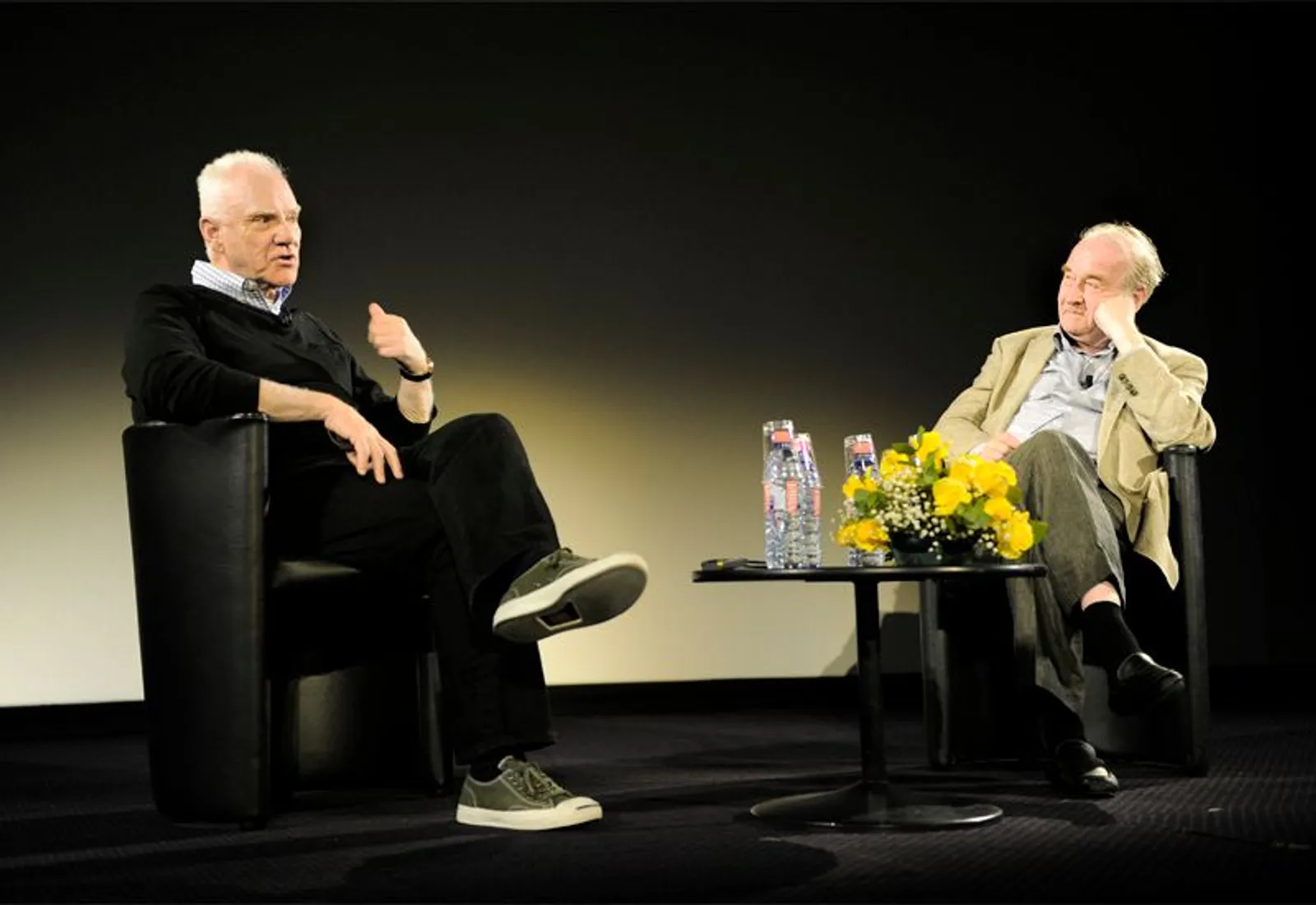 Malcom McDowell y Michel Ciment