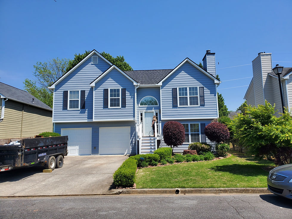 Completed new roof replacement on a two-story home in Dallas, GA by Optimum Roofing