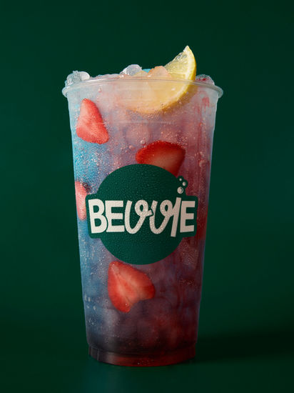 Bevvie Dirty Soda with Water + Blueberry + Raspberry + Frozen Strawberries +  Lemon Wedge