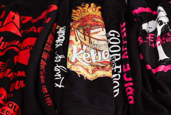 a black shirt with a king of kebob logo on it