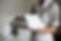 young-hotel-maid-standing-holding-fresh-clean-towels.jpg