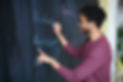 photo-of-person-writing-on-blackboard-31