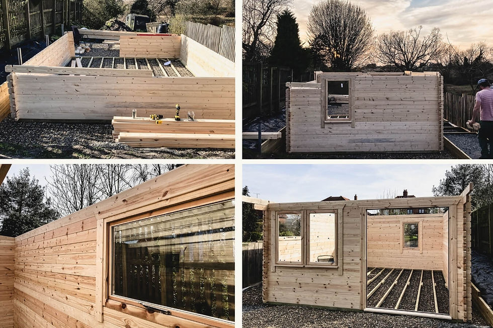 Log cabin walls being assembled during garden studio build process