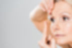 Lady Inserting a contact lens