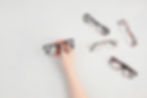 Woman Hand Holding Eyeglasses