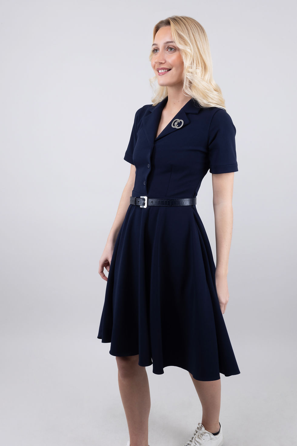 Préparation des tenues et accessoires avant un shooting photo professionnel en studio