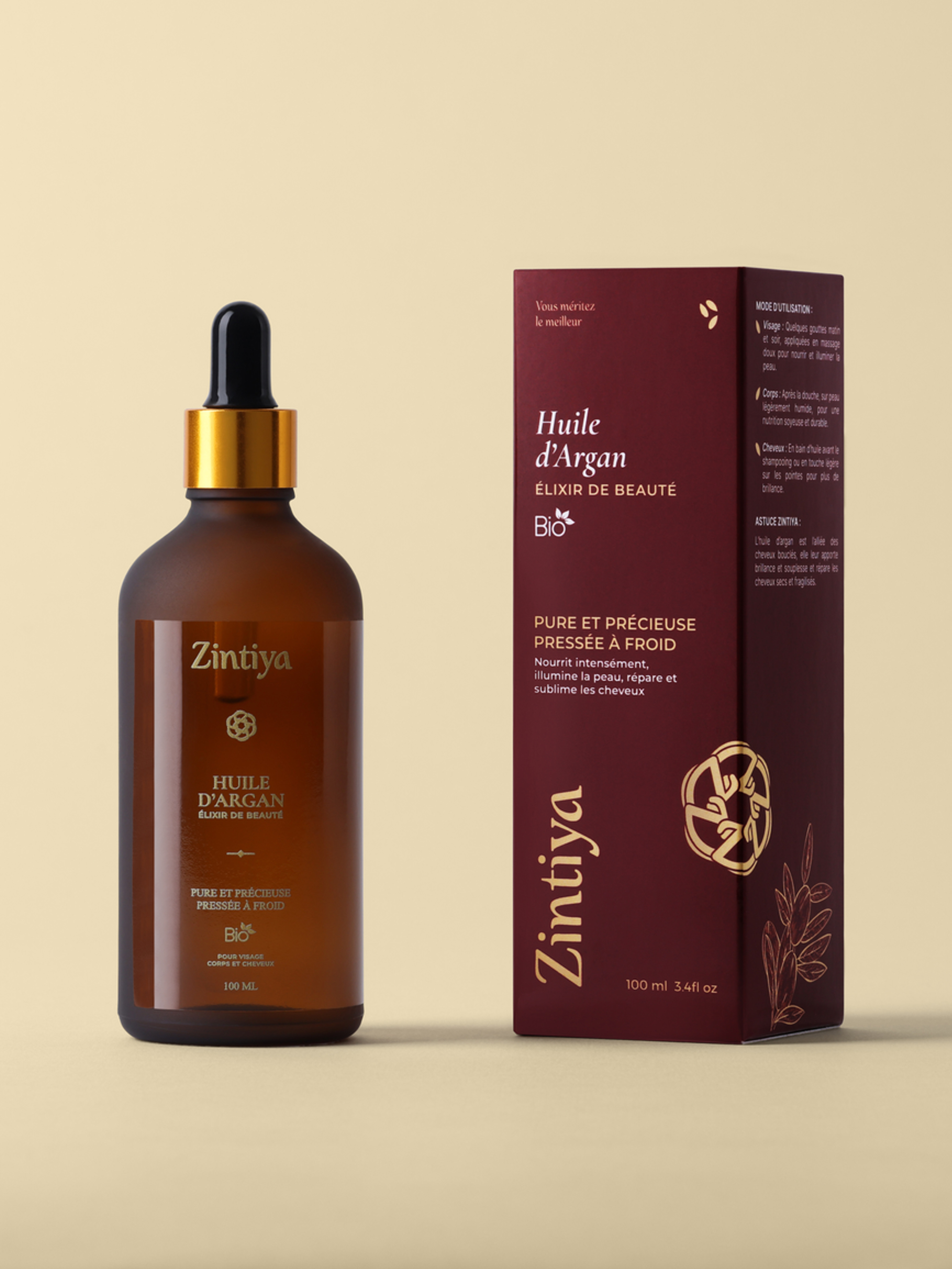 Photographie packshot d’un flacon cosmétique et de son emballage sur fond beige