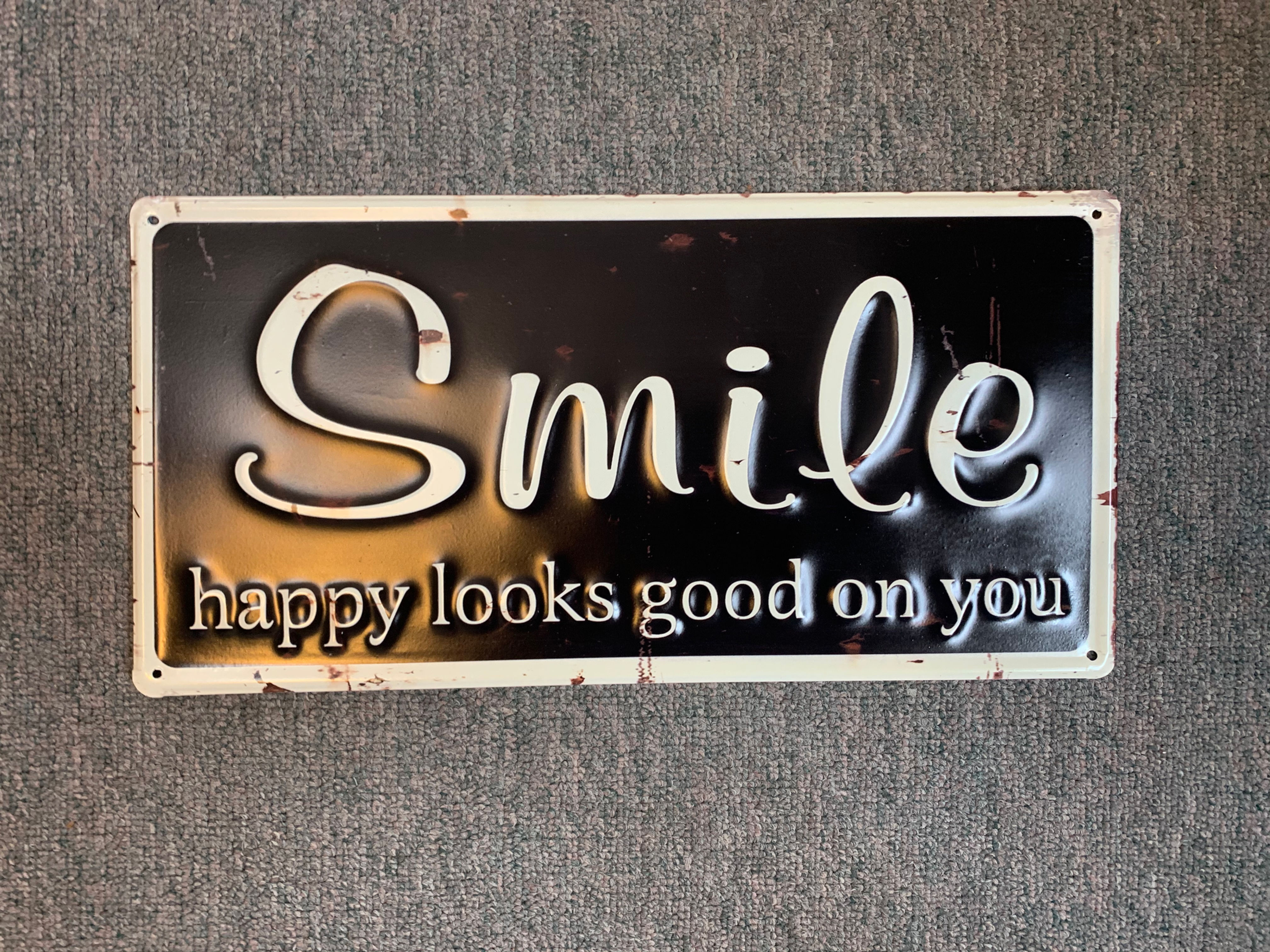 Smile, Sign
