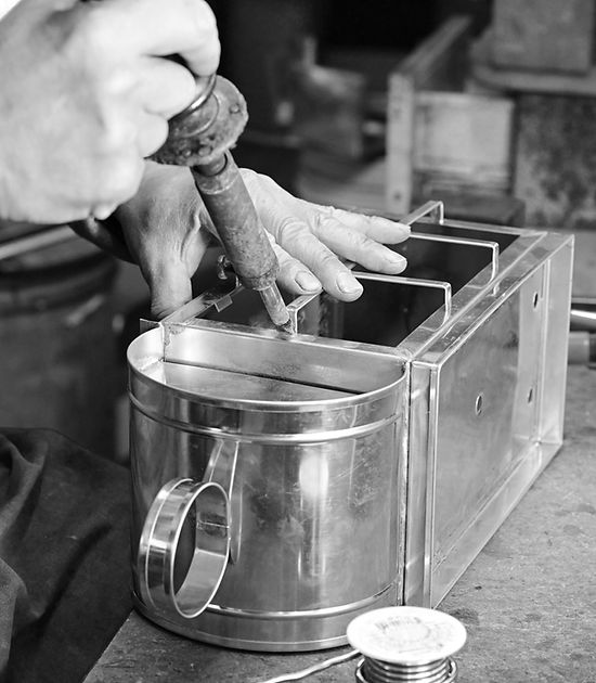 A 108 Wall fixture being assembled in our shop