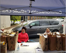 Women providing bags of food at Dibert Food Pantry, Richmond
