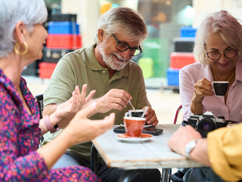 Group of people enjoying hot drinks at a coffee shop