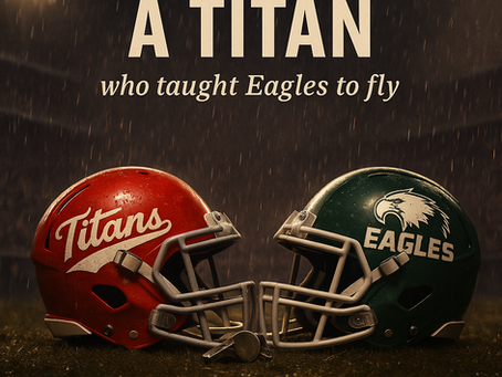 A nighttime football field under stadium lights in the rain. Two empty helmets sit on the wet turf side by side: a red Skyline Titans helmet on the left and a green Laney College Eagles helmet on the right. Rain falls softly through the light, reflecting loss and remembrance. A quiet memorial tribute to Oakland coach John Beam.