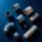 PVC fittings on very dark blue background with strong shadows, high quality photography.jp