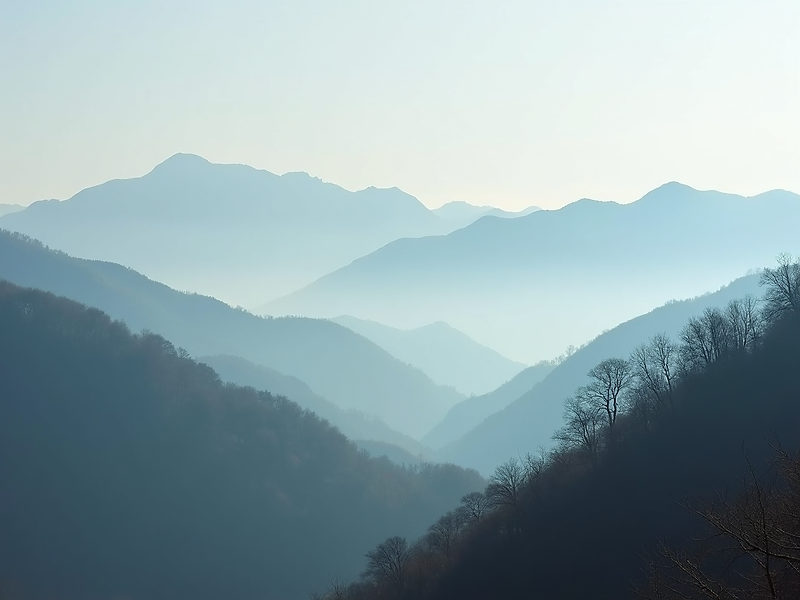 A serene natural landscape in Nagano, Japan, with mist rising from mountains, hinting at n